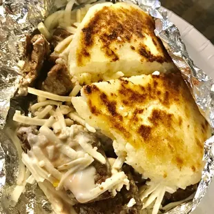 Steak and cheese arepa