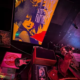 a man playing guitar in a bar