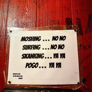a no surfing sign on a wall