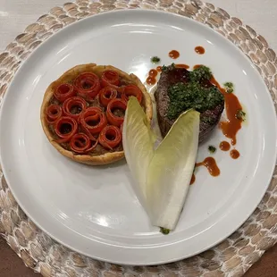 Stemple Creek petite tender steak, caramelized onion galette, tarragon salsa verde &amp; carrot jus