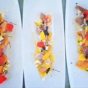 Ahi Tuna Crudo with leche de tigre, coconut, peach and wildflowers