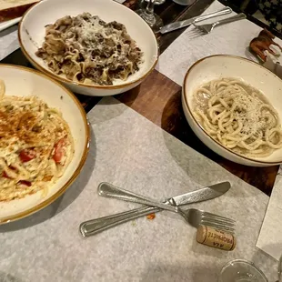 Crab pasta, mushroom pasta, and cacio e pepe (left to right)