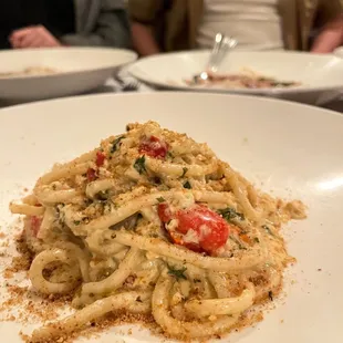 a pasta dish on a white plate