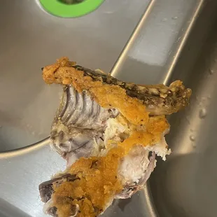 a piece of meat in a sink