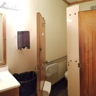 Ladies has 2 small stalls. No room in here for a baby changing station.