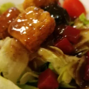 Side salad w/entree includes diced beet and black olive.