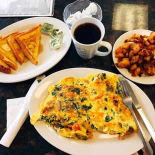 Milkbutter french toast &amp; spinach tomato mushroom omelette with potato &amp;