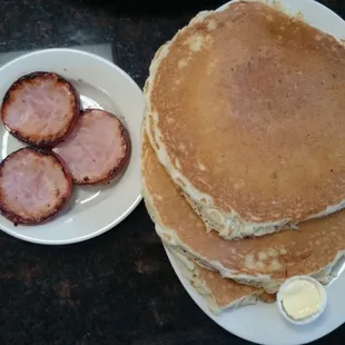 Banana pancakes with side of Canadian bacon