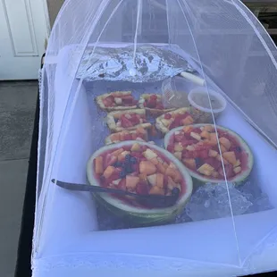 Beautifully-displayed fruit salad and everything kept cold on a hot day!