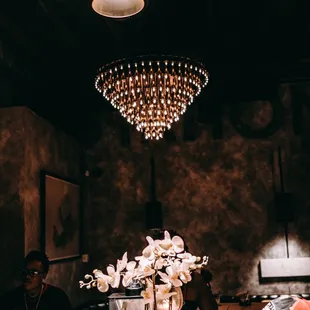 a dining room with a chandelier