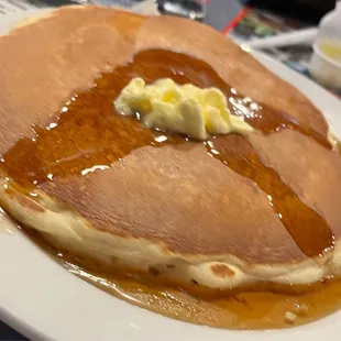Pancake was fluffy and good served with hot syrup.