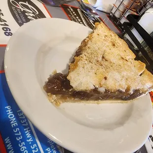 a slice of pie on a plate
