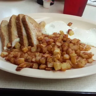 2 eggs over easy with wheat toast &amp; fried potatoes. Potatoes were deep fried, but at least they weren&apos;t mushy. Hit the spot!