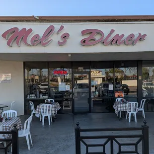 Outside, love the old faded sign