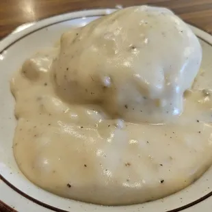 The biscuit was rock hard like it was made a month ago. The gravy was delicious and homemade.