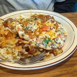 The Works omelette with home fries, we chose egg whites.