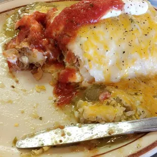 Egg and taco meat burrito with green chili sauce on top! Amazing! :D