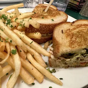 Turkey Pesto melt has fresh pesto, hand-carved turkey, mozzarella on toasted sourdough, $20.25 with fries
