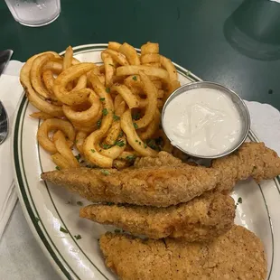 Chicken tenders with curly fries