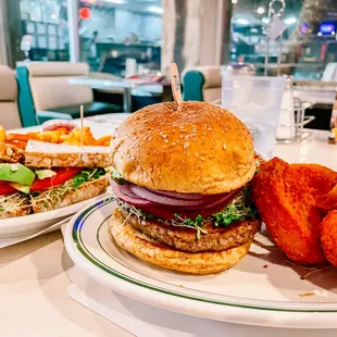 a burger and fried chicken