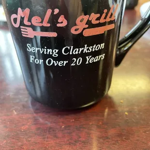 Mel&apos;s Grill mugs of hot coffee