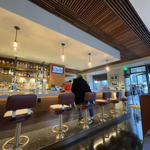 a man sitting at the bar
