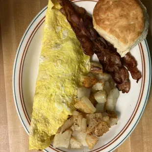 Western omelette with home fries and a biscuit