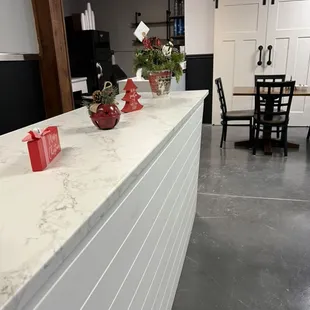 the kitchen counter and dining room