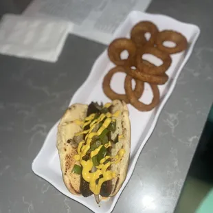 MY hot sausage and onion rings were bomb. The lumpia too.