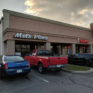 cars parked in front of the store