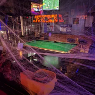 Illusion?! I think so. That side of the bar is only tables, not of the pool kind. Nice and clean, this place is.