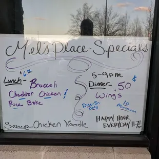 a sign in the window of a restaurant