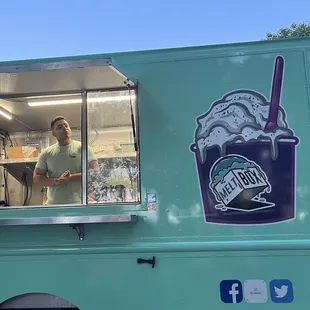 a man in a green truck