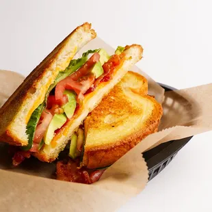 a grilled sandwich in a basket