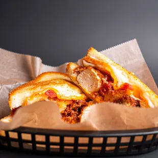a grilled sandwich in a basket