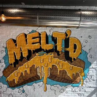 a graffiti of a doughnut with melted icing