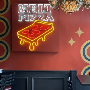 Neon sign at front of house