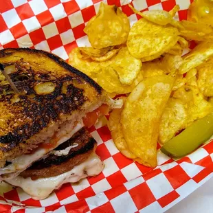 The Rimatore: Provolone, fresh mozzarella, sliced tomato and chiffonaded basil on Portland French Bakery rustic white.