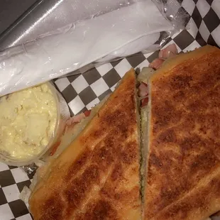 Tripleta with a side of potato salad
