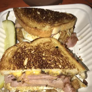 Morning Meltdown: grilled ham, fried eggs, bacon, cheese and I can&apos;t recall what else but so delicious!!