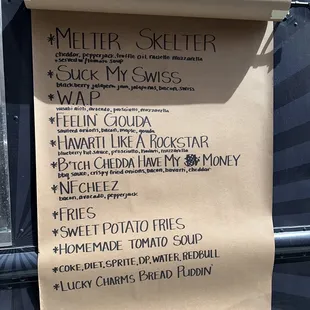 a menu on a roll of paper