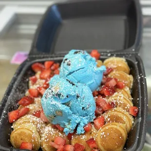 Mini pancakes topped with it&apos;s ice cream