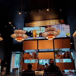 Bar seating that overlooks open prep area