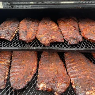 ribs cooking on a grill