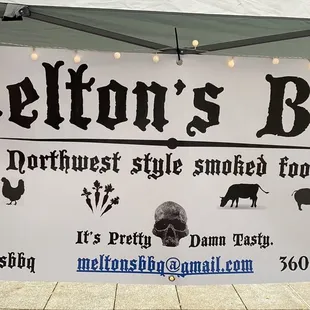 a sign for melton&apos;s bbq