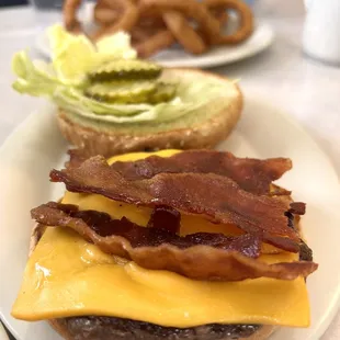 Yum bacon cheeseburger. Onion rings.