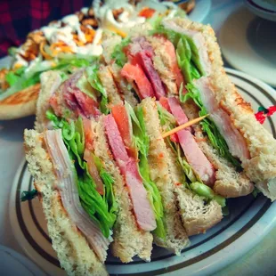 a plate of sandwiches