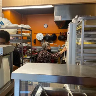 The woman is the owner.