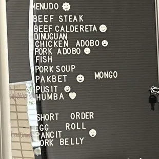 Small menu the smiles mean they have it today. Unfortunately they had to update as there was no pork adobo