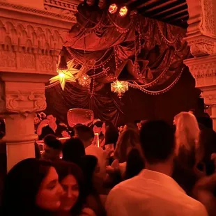 a crowd of people at a party